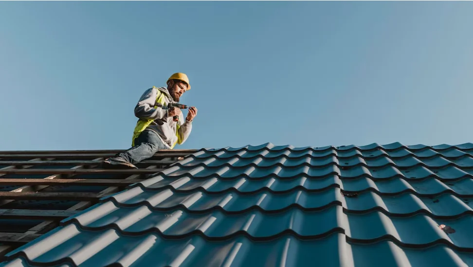 Roofer working on a tiled roof